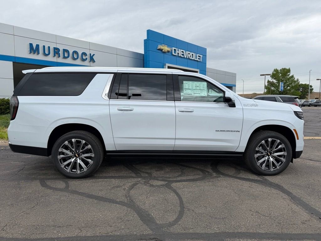 2026 Chevrolet Suburban High Country in Polar White Tricoat — front three-quarter view