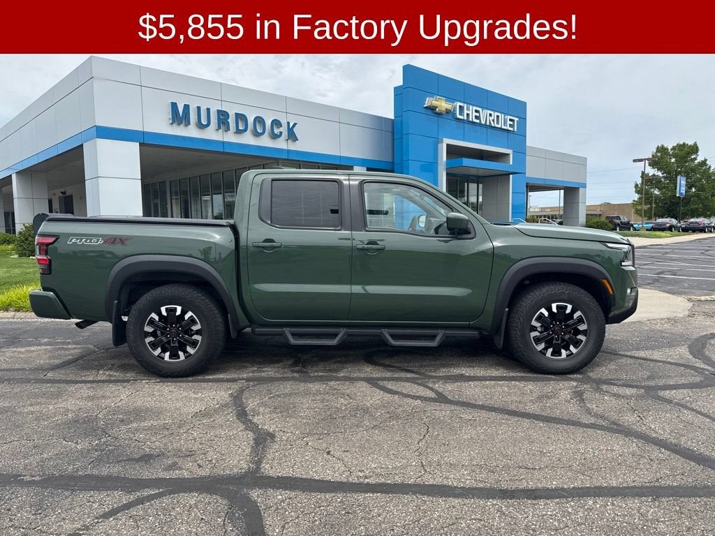 2023 Nissan Frontier Crew Cab PRO-4X 4x4 in Green — front three-quarter view